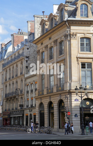 Paris France,9th arrondissement,Place Vendôme,Charvet,Velib bike share system station,historic Haussmann condominium,residential,apartment,apartments, Stock Photo