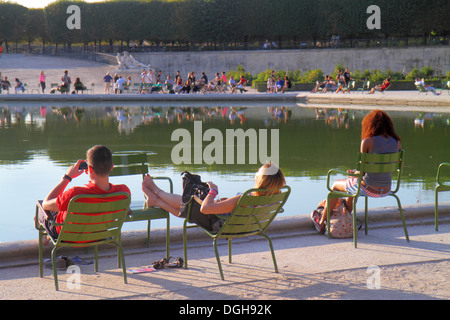 Paris France,8th arrondissement,Place de la Concorde,Tuileries Garden,Jardin des Tuileries,park,trees,chairs,residents,Bassin Octogonal,Basin,resting, Stock Photo