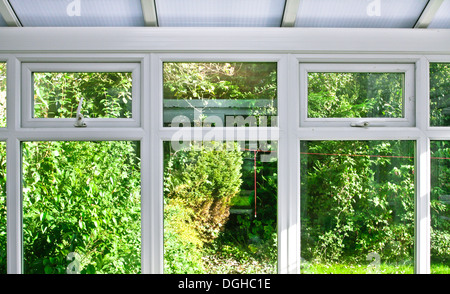 Modern home conservatory windows with garden view Stock Photo