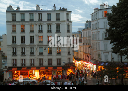 Paris France,18th arrondissement,Montmatre,Place Saint St. Pierre,Rue de Steinkerque,view from Square Louise Michel,night evening,shopping shopper sho Stock Photo