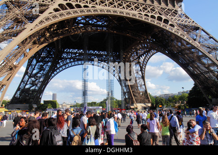 Paris France,7th arrondissement,Eiffel Tower,base,crowds,crowd,legs,pillars,line,queue,France130819152 Stock Photo