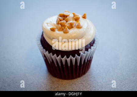 A Peanut Butter Bliss chocolate cupcake topped with a peanut butter buttercream from Whimsical Cake Studio in Edmonton, Canada. Stock Photo