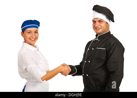 Chef male and waitress giving handshake isolated on white background Stock Photo