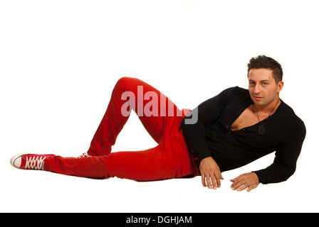 A Man Wearing a Black Shirt and Red Pants  Free Stock Photo