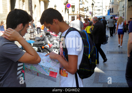 Paris France,Europe,French,9th arrondissement,Boulevard Haussmann,teen teens teenage teenager teenagers youth adolescent,boy boys lad lads male kid ki Stock Photo