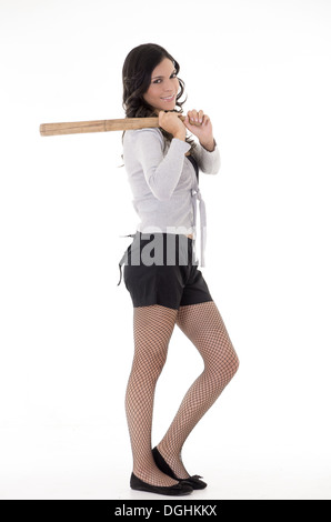 Pretty  hispanic lady with a baseball bat, studio portrait Stock Photo