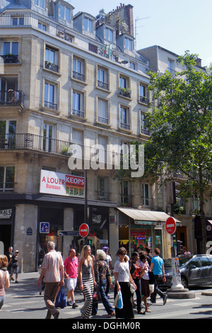 Paris France,Europe,French,2nd arrondissement,Rue Rambuteau,street,residents,crossing,Haussmann condominium,residential,apartment,apartments,flat,flat Stock Photo