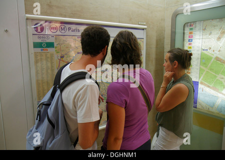 Paris France,1st arrondissement,Palais Royal - Musée du Louvre Metro Station Line 1 7,subway,train,riders,system map,highway Routes,routing,man men ma Stock Photo