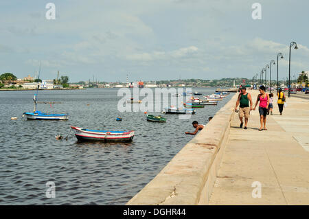 Fishing boats on the Malecon esplanade in Havana, Cuba, Caribbean Stock Photo