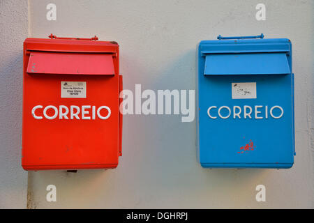 Red and blue mailboxes, Alfama, Lisbon, Lisbon District, Portugal Stock Photo