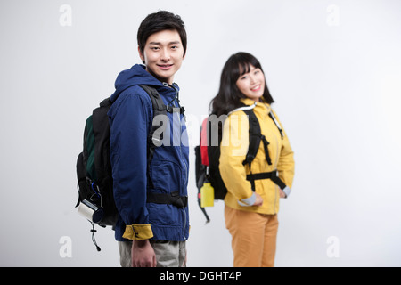 a couple wearing hiking gear Stock Photo