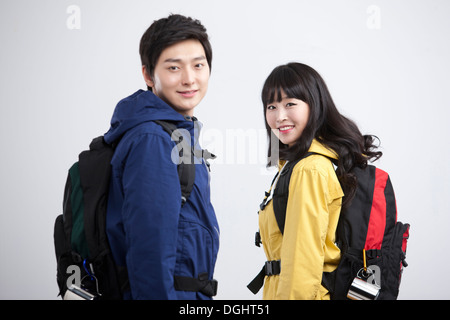 a couple wearing hiking gear Stock Photo