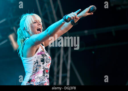 Singer and frontwoman Janine Jini Meyer of the German pop band Luxuslaerm performing live at the Heitere Open Air festival in Stock Photo