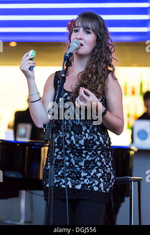 Singer Rea Hunziker of the Swiss Bossa Nova, Samba and LatinJazz-Band 'Rea Som' performing live in front of the KKL lake bar at Stock Photo