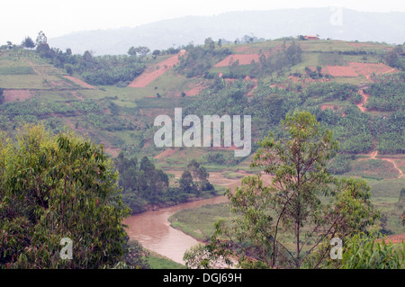 Muddy River Gitarama meandering through the fertile landscape The land of 1000 Hills Rwanda Central Africa Stock Photo