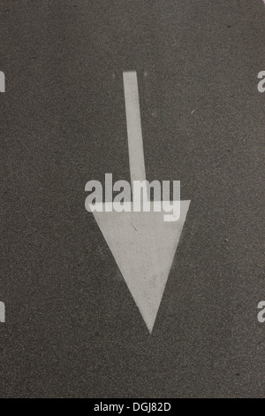 arrow on the road - indicator Stock Photo