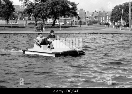 two young boys using a pedalo on canoe lake southsea uk during the 1990s Stock Photo