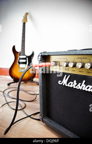 Electric guitar and amplifier. Stock Photo