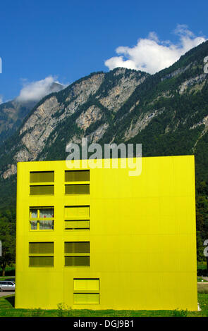 Yellow multi-family house in the Les Iles residential quarter, St Maurice, Valais, Switzerland, Europe Stock Photo