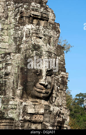 Smile of Angkor, huge face carved in stone on a tower, Bayon Temple, Angkor Thom, Siem Reap, Cambodia, Southeast Asia, Asia Stock Photo