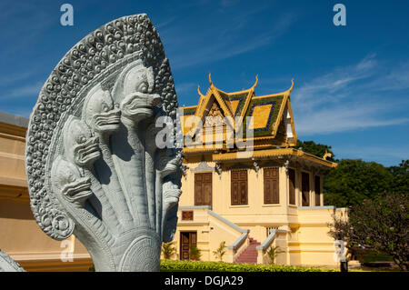 Sculpture of a seven-headed Naga snake in front of the Royal Hor Samran Phirun pavilion on the grounds of the Royal Palace Stock Photo