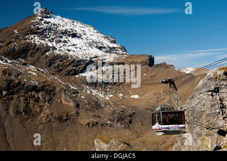 Cabin of the Schilthorn Cableway between the intermediate station of Birg and the summit of Schilthorn Mountain, Berner Oberland Stock Photo