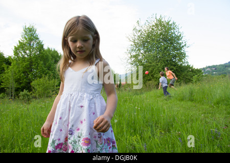 Outdoor portrait of young girl in floral dress Stock Photo