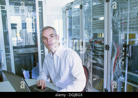 Computer technician working on server Stock Photo