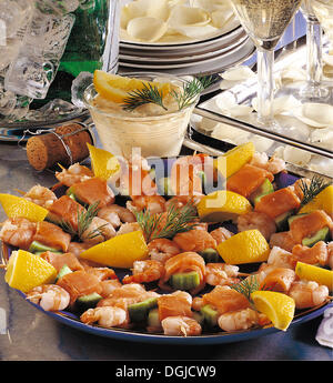 Shrimp and salmon skewers with dill mayonnaise, Norway. Stock Photo