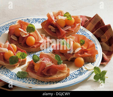 Canapés with Parma ham, Italy. Stock Photo