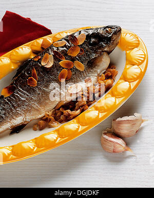 Trout with Serrano ham and sliced almonds, Spain. Stock Photo