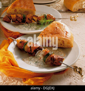 Kebab skewers with yoghurt dip, marinated lamb with aubergines and zucchinis, skewered and grilled, Turkey Stock Photo