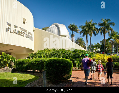 Tourists walking into The Sir Thomas Brisbane Planetarium in Brisbane Botanic Gardens. Stock Photo