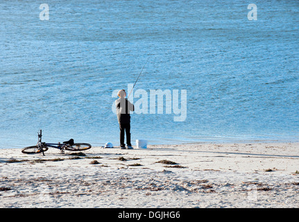 A young boy fishing on Middleton Beach in Albany in Western Australia. Stock Photo