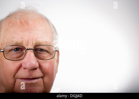 Portrait of senior man wearing glasses, studio shot Stock Photo