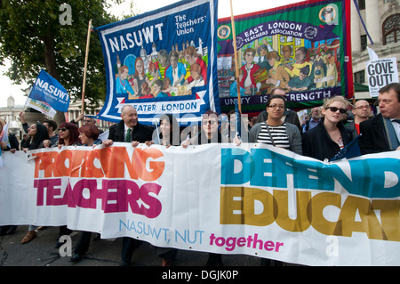 October 17th 2013. Teachers demonstrate against proposed changes to pensions, marching with Union banners Stock Photo