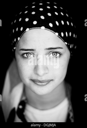 Close-up Of A Young Syrian Refugee Face With Blue Eyes, Erbil, Kurdistan, Iraq Stock Photo