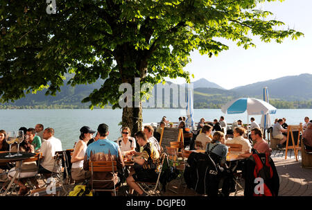 Beer garden on Lake Tegernsee, Upper Bavaria, Bavaria Stock Photo