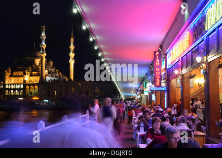 Restaurants under the Galata Bridge, Golden Horn, New Mosque, Yeni Cami, Istanbul, Istanbul Province, Turkey Stock Photo
