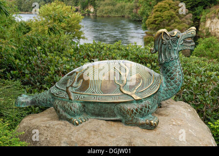 Bronze turtle, mythical creatures, Japanese Garden of Contemplation, Hamilton Gardens on the Waikato River, Hamilton Stock Photo