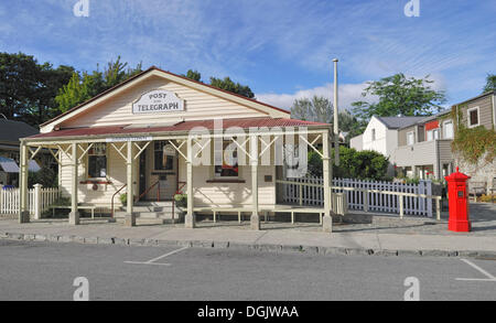 Historic post and telegraph building with the mailbox in the former gold mining town of Arrowtown, South Island, New Zealand Stock Photo