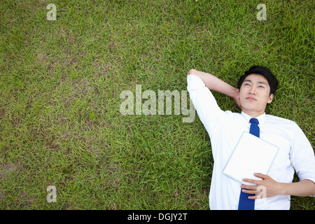 Carfree Man Laying On The Floor Thinking Stock Photo - Download Image Now - Lying  Down, Men, People - iStock