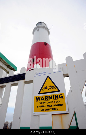Portland Bill lighthouse with loud fog horn warning sign Dorset coast UK Stock Photo