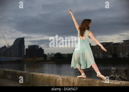 Ballet dancer on wall Stock Photo