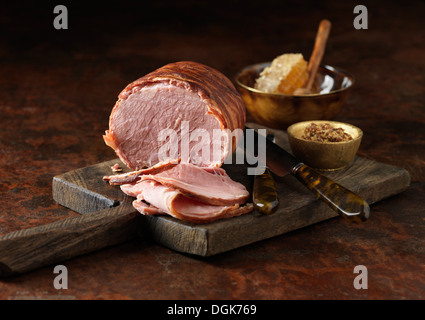 Honey roast ham with wholegrain mustard and honeycomb Stock Photo