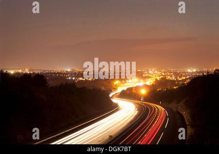 Traffic on road at night in Toulouse, France Stock Photo