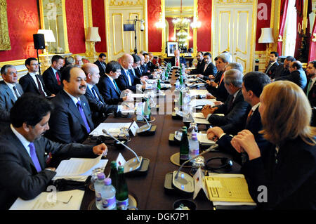 US Secretary of State John Kerry attends the London 11 meeting on Syria with his counterparts from Egypt, France, Germany, Italy, Jordan, Qatar, Saudi Arabia, Turkey, and the United Arab Emirates October 22, 2013 in London, United Kingdom. Stock Photo