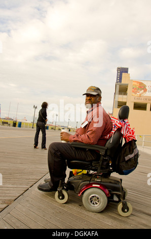 Vietnam war veteran in wheelchair at boardwalk at Atlantic CIty, New Jersey, United states Stock Photo
