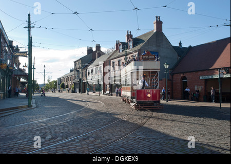 Vintage tram with passengers in open air museum. Stock Photo