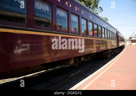 Diesel locomotive pulling pasenger wagons through New Hope & Ivyland Railroad, historic Bucks County, Pennsylvania. USA. Stock Photo